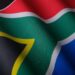 the flag of south africa is waving in the wind